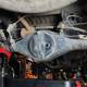 Draining the rear differential oil. One of the four gearboxes to attend to.